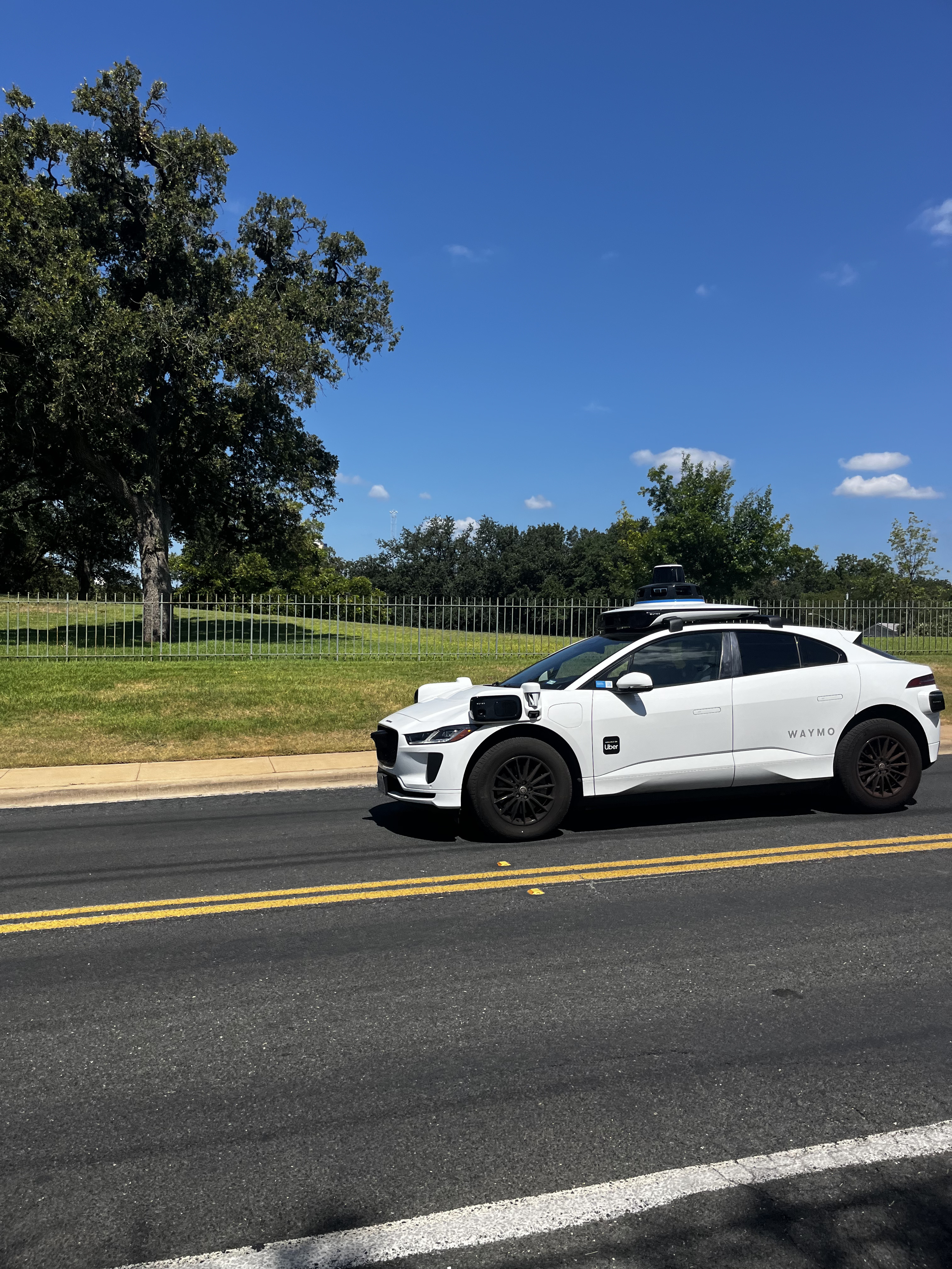 Waymo's driverless tech cruisin' on the streets. 🚗💨