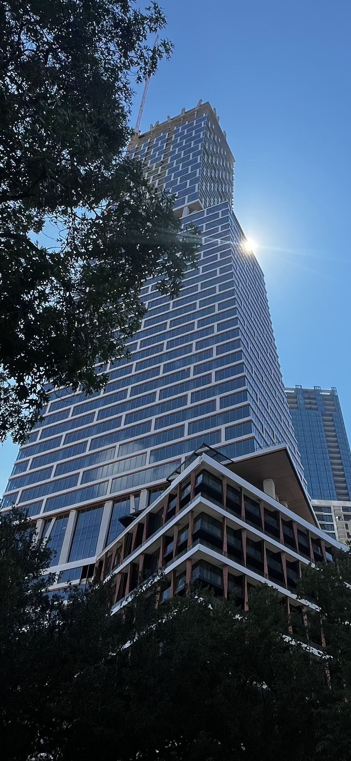 Modern high-rise construction in an urban setting.
