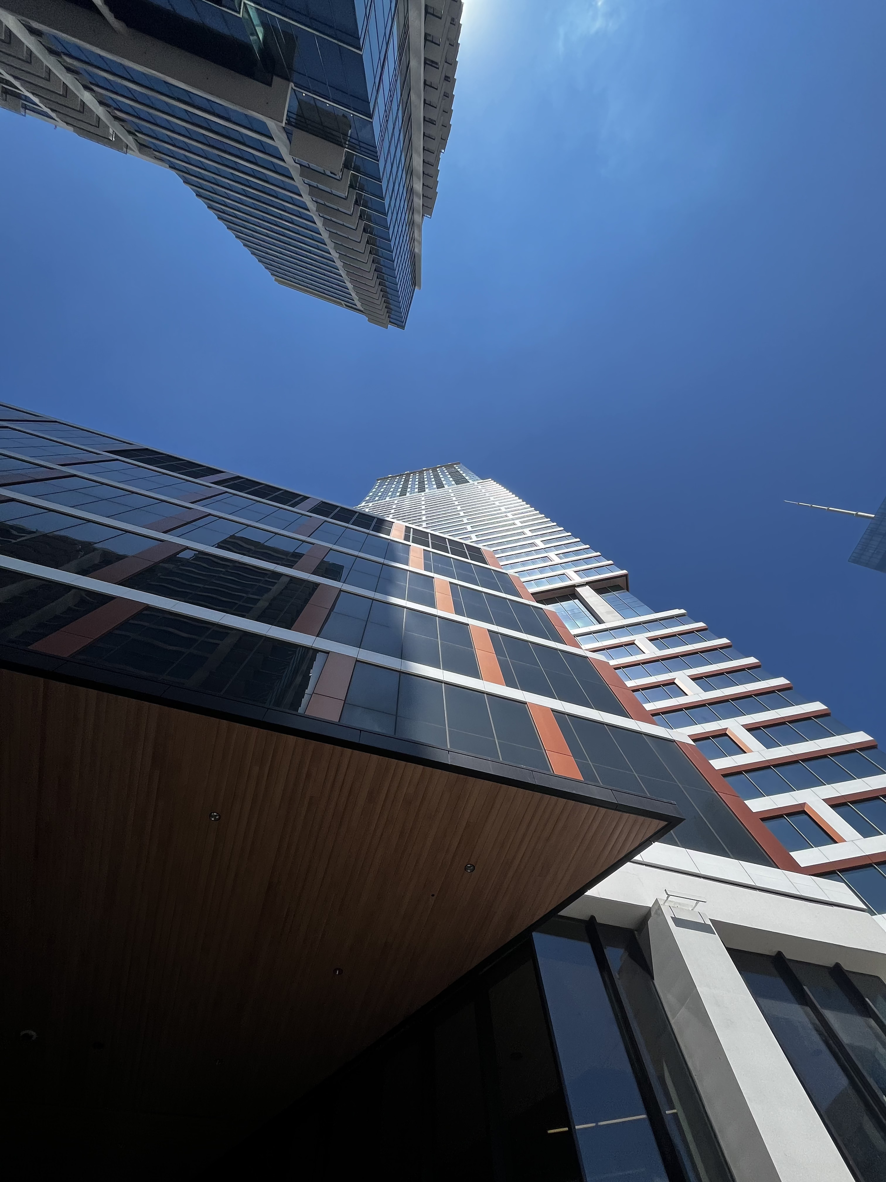 Modern architecture meets the sky in this urban scene.