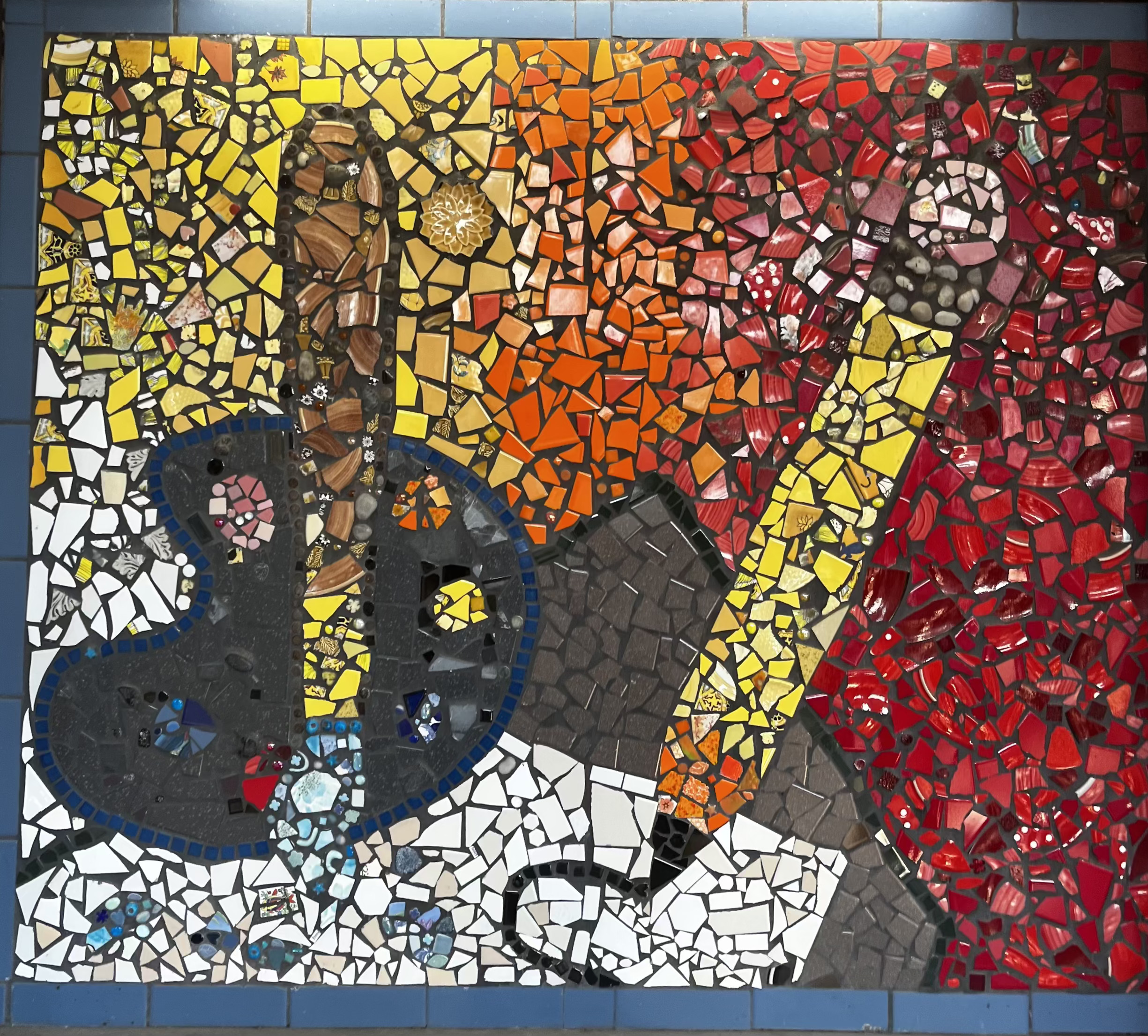Mosaic of guitar and flowers, vibrant and unique.