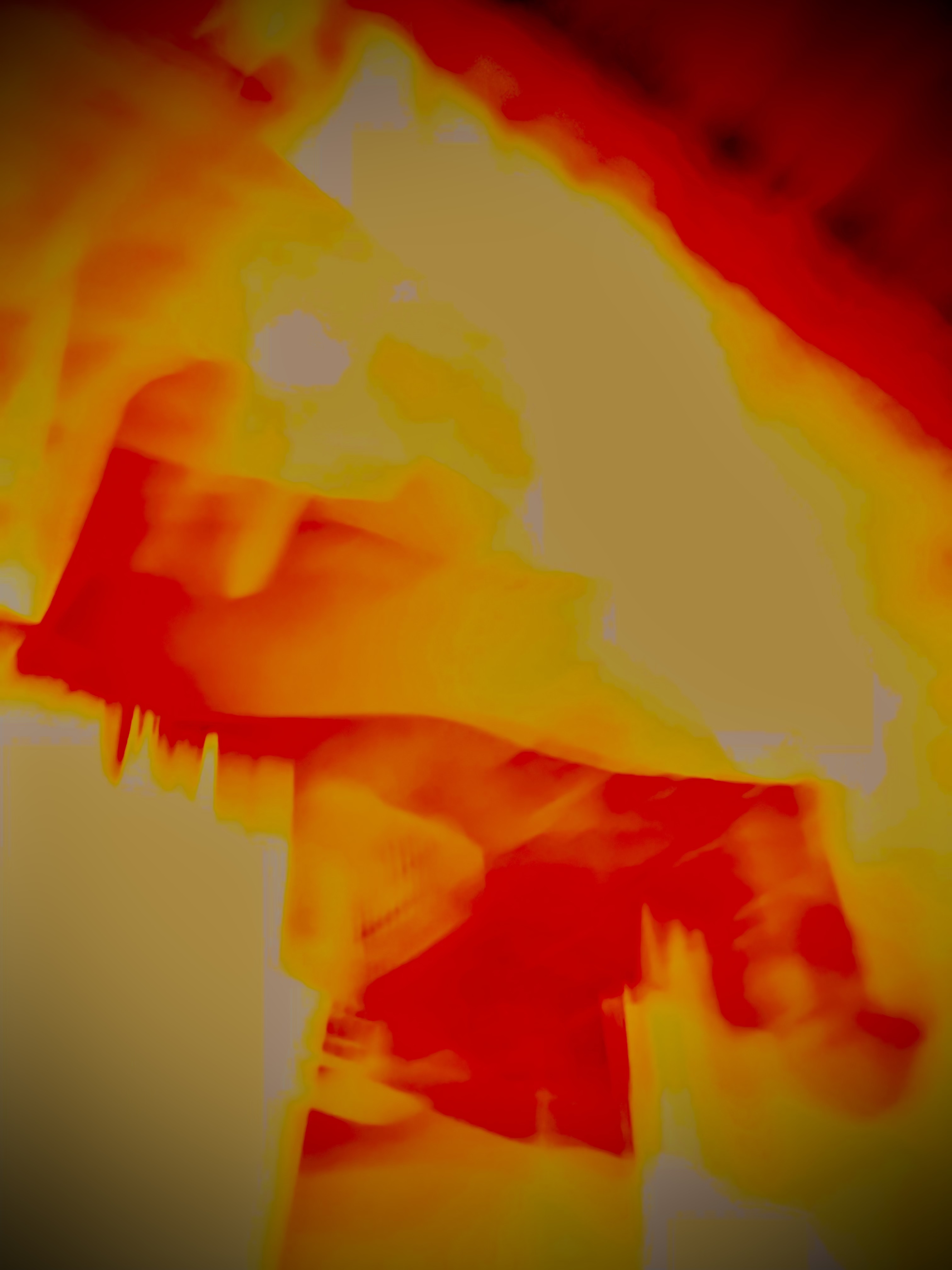 Abstract expression: Fiery hues dance in bold, blurred strokes.