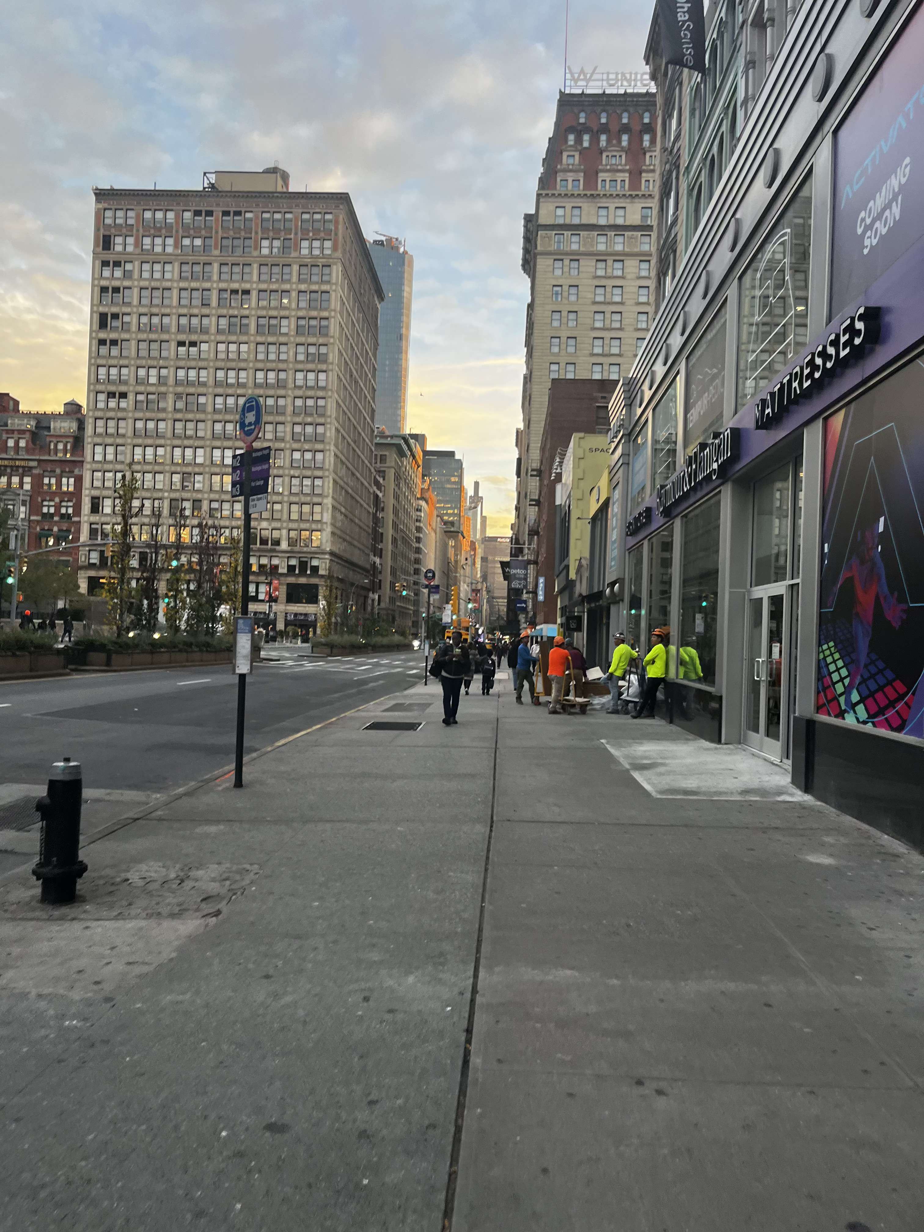 New York City street scene with construction and people.