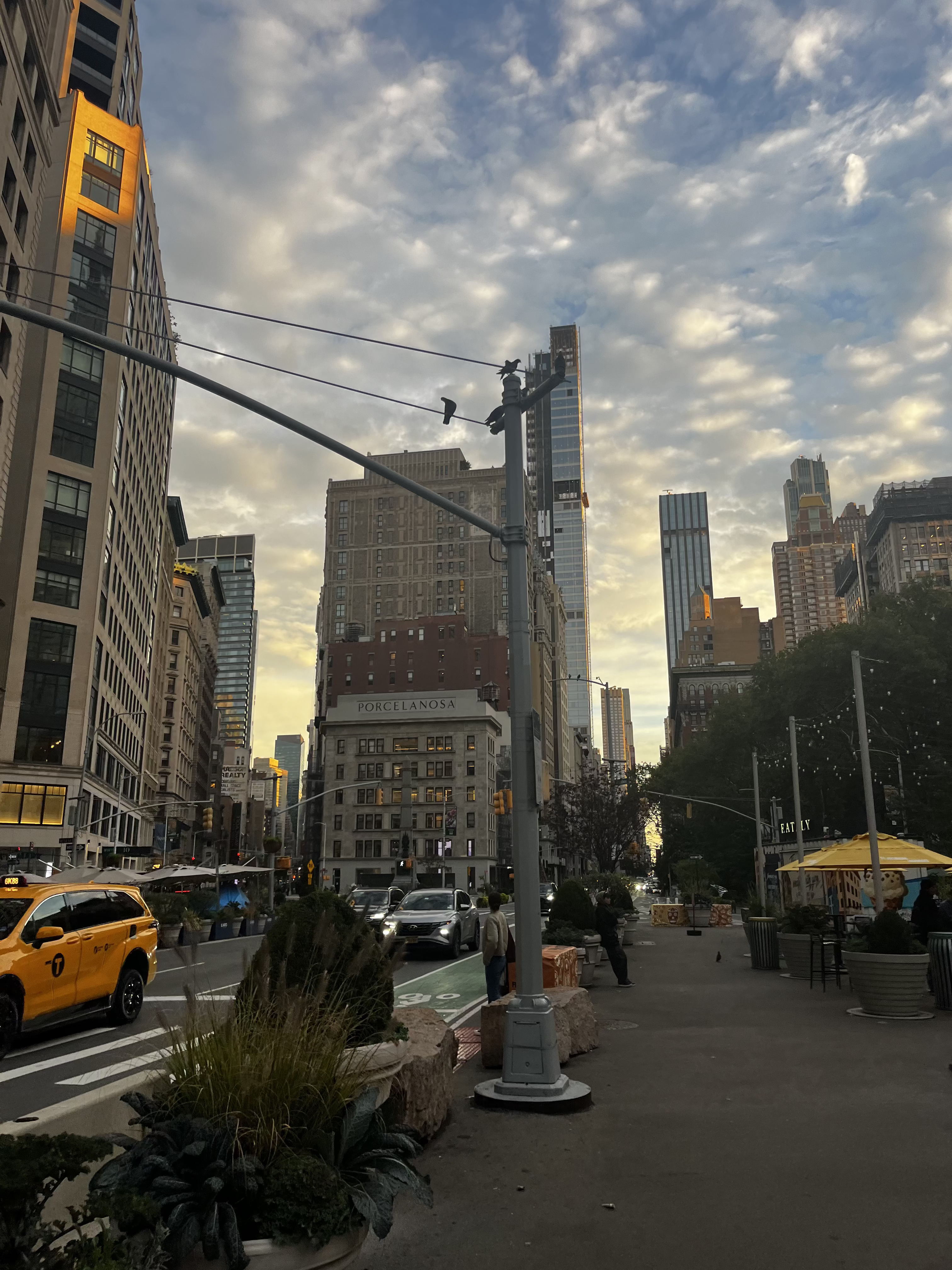 New York City streets bathed in sunset hues.