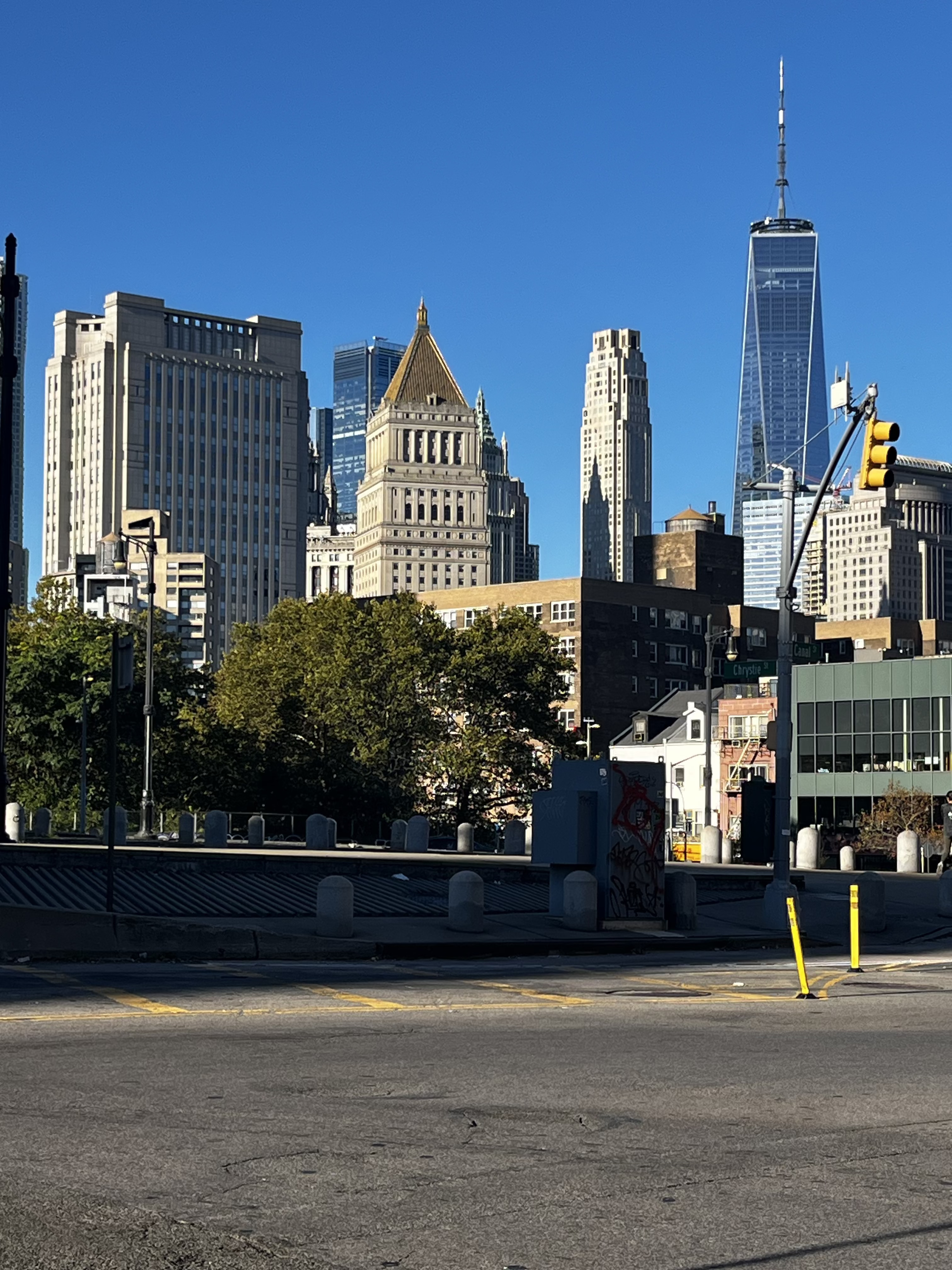 Downtown New York City skyline on a sunny day.