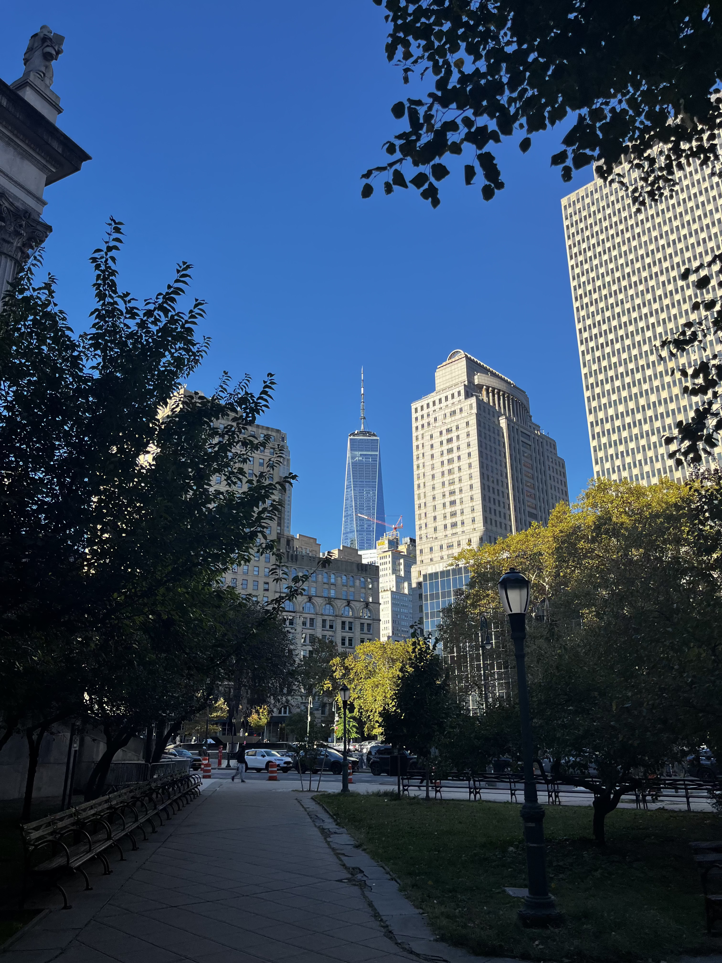 NYC's Freedom Tower soars above the park's serenity.